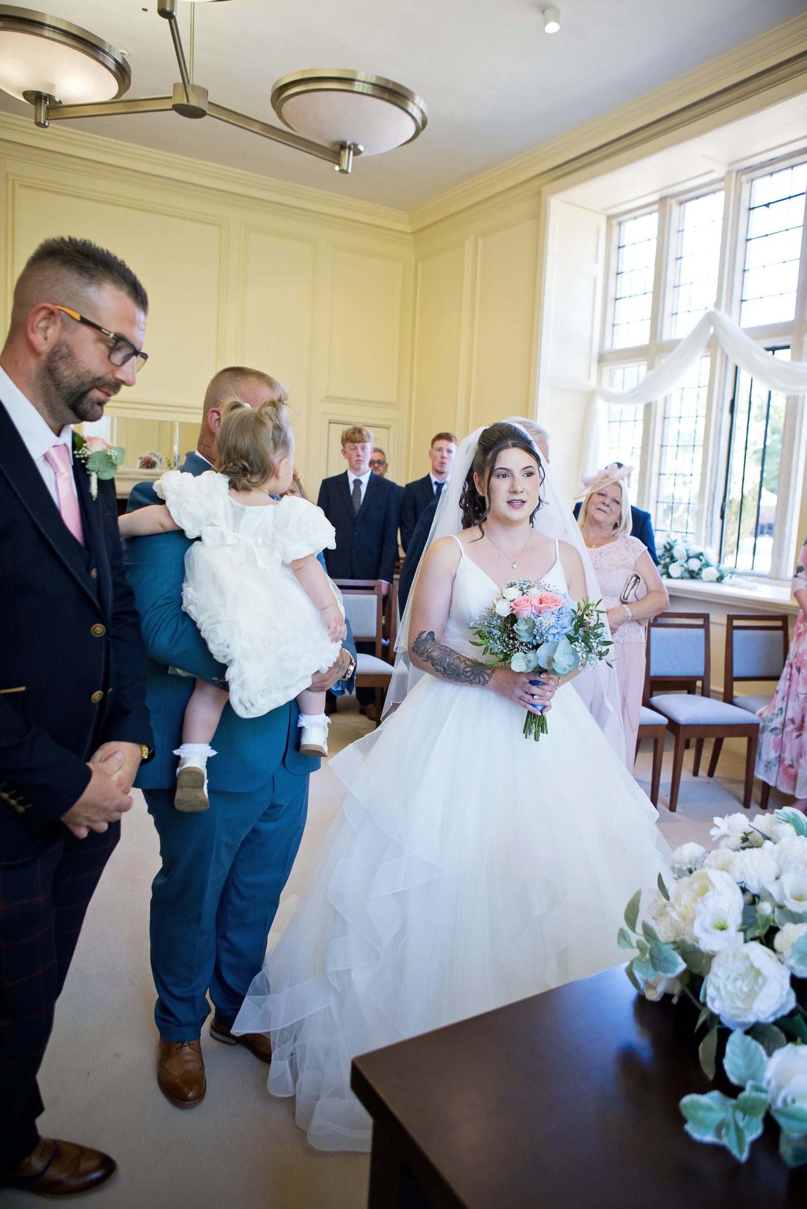 The bride entering the ceremony room